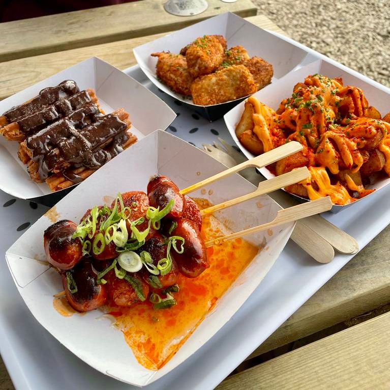 Tapas spread on a wooden board
